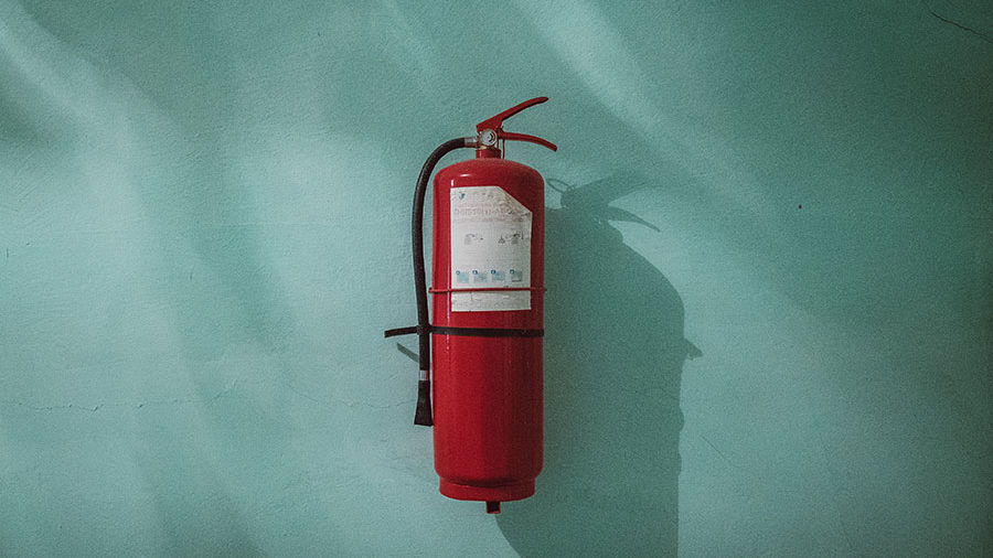 fire extinguisher mounted on wall
