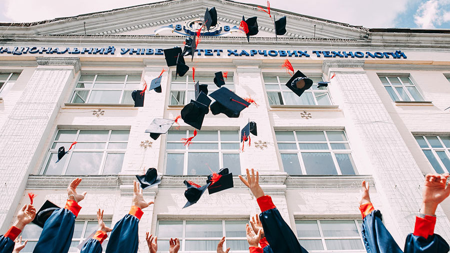 college students celebrating graduation